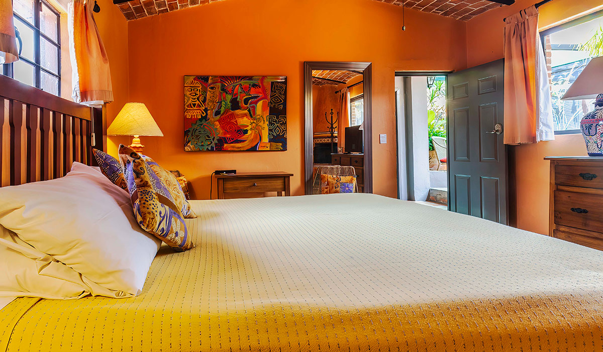room 5 bed and entry door